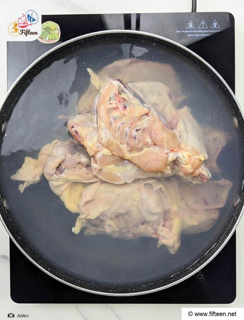 Add The Chicken Bones To The Pot